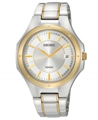 A classic men's timepiece updated with golden accents for a captivating creation, by Seiko. A classic men's timepiece updated with golden accents for a captivating creation, by Seiko.