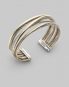 From the Silver Classics Collection. Sterling silver and 18K gold crossover bracelet. Made in USA. 
