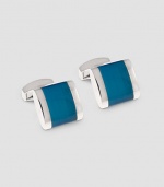 Elegant links with gleaming rhodium plating with a blue fiberglass inlay. T-bar clasp ½ X ¾ Imported