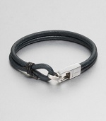 A double strand of smooth leather is accented by a sterling silver clasp.LeatherSterling silverLobster claspAbout 2½ diam.Made in the United Kingdom