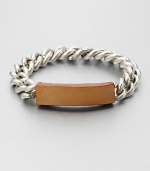 A distinctive blend of supple leather and sleek link chain. LeatherBrassDiameter, about 3Push clasp closureMade in Italy