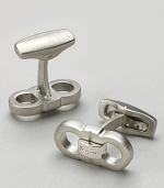 Salvatore Ferragamo classic double Gancini cuff links. Classic double Gancini cuff links with Ferragamo etched in the center.