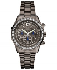 Shimmering accents offer a stark contrast on this dusky timepiece from GUESS. Shimmering accents offer a stark contrast on this dusky timepiece from GUESS.