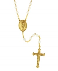Show your devotion with dramatic style. Rosary-style necklace by Vatican features an intricate crucifix and polished glass pearls set in gold tone mixed metal. Approximate length: 26 inches. Approximate drop: 6-1/4 inches. Show your devotion with dramatic style. Rosary-style necklace by Vatican features an intricate crucifix and polished glass pearls set in gold tone mixed metal. Approximate length: 26 inches. Approximate drop: 6-1/4 inches.