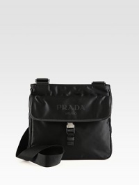 Streamlined, yet functional crossbody design crafted in smooth, logo-printed nylon.Flap, buckle closureAdjustable shoulder strapNylon11W x 10H x 3DMade in Italy Streamlined, yet functional crossbody design crafted in smooth, logo-printed nylon.Flap, buckle closureAdjustable shoulder strapNylon11W x 10H x 3DMade in Italy