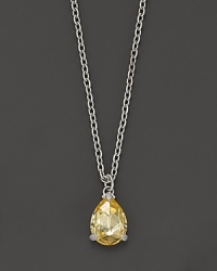 A faceted, pear-cut canary crystal, set in sterling silver, adds timeless style to this necklace. A faceted, pear-cut canary crystal, set in sterling silver, adds timeless style to this necklace.