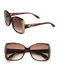 Get noticed in these glamorous printed frames with ridged metal accents. Available in black melange grey/dark ruthenium with smoke gradient lens or light brown melange gold/light bronze with brown gradient lens. Logo temples100% UV protectionMade in Italy Get noticed in these glamorous printed frames with ridged metal accents. Available in black melange grey/dark ruthenium with smoke gradient lens or light brown melange gold/light bronze with brown gradient lens. Logo temples100% UV protectionMade in Italy