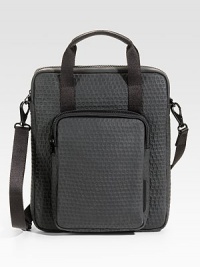 Tote your tech devices around in style with this signature-stamped leather shoulder bag with front zip pocket.Zip closureTop handlesShoulder strapExterior zip pocketFully lined11½W x 15¼H x 1DImported Tote your tech devices around in style with this signature-stamped leather shoulder bag with front zip pocket.Zip closureTop handlesShoulder strapExterior zip pocketFully lined11½W x 15¼H x 1DImported