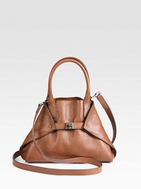 Rich pebble-grain leather crafted in a foldover trapezoid silhouette, cinched by a center turn-lock buckle closure.Double top handles, 4½ dropDetachable shoulder strap, 26 dropVersatile turn-lock buckle closure, can be tucked into bag for a tote silhouetteProtective metal feetOne inside zip pocketTwo inside open pocketsLinen lining10W X 7½H X 3DImported Rich pebble-grain leather crafted in a foldover trapezoid silhouette, cinched by a center turn-lock buckle closure.Double top handles, 4½ dropDetachable shoulder strap, 26 dropVersatile turn-lock buckle closure, can be tucked into bag for a tote silhouetteProtective metal feetOne inside zip pocketTwo inside open pocketsLinen lining10W X 7½H X 3DImported