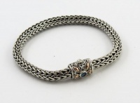 Sterling Silver Bali Braclet 8 Inch with Blue Topaz and 18k Gold Accents