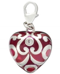 Put your heart into it. This intricate heart charm features a scrolling silver and cubic zirconia accent design. Crafted in sterling silver. Approximate drop: 1/2 inch. Put your heart into it. This intricate heart charm features a scrolling silver and cubic zirconia accent design. Crafted in sterling silver. Approximate drop: 1/2 inch.