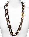 Timeless glamor is a hallmark of the Michael Kors brand. Make the look your new signature with this classically styled tortoise shell link necklace.