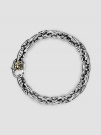 Link-style design in gleaming sterling silver with a signature 18k gold accent clasp. About 8½ long Lobster clasp Made in USA