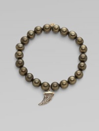 This pyrite beaded, stretch design is accented with a diamond embellished 14k gold and rhodium horn charm for a modern look. Pyrite beads14K goldDiamonds, .22 tcwLength, about 6¾Elastic slip-on styleMade in USA of imported materials This pyrite beaded, stretch design is accented with a diamond embellished 14k gold and rhodium horn charm for a modern look. Pyrite beads14K goldDiamonds, .22 tcwLength, about 6¾Elastic slip-on styleMade in USA of imported materials