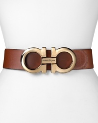 Sophisticated accessories are key to transforming your look, so invest in this reversible Salvatore Ferragamo belt, crafted of elegant leather. A bold buckle cinches this statement piece. Sophisticated accessories are key to transforming your look, so invest in this reversible Salvatore Ferragamo belt, crafted of elegant leather. A bold buckle cinches this statement piece.