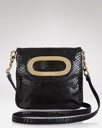 In shiny patent python, MICHAEL Michael Kors' crossbody bag is a city girl's go-to. In shiny patent python, MICHAEL Michael Kors' crossbody bag is a city girl's go-to.