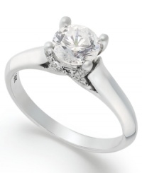 A design that sparkles from every angle. This stunning certified diamond X3 solitaire ring (1 ct. t.w.) features a beautiful round-cut diamond at center, as well as sparkling diamond accents in an X shape in the sides of the band. Crafted in 18k white gold. A design that sparkles from every angle. This stunning certified diamond X3 solitaire ring (1 ct. t.w.) features a beautiful round-cut diamond at center, as well as sparkling diamond accents in an X shape in the sides of the band. Crafted in 18k white gold.