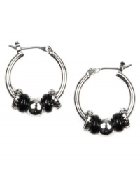 These mini hoops make a stylish impact. Nine West design features a shiny hoop setting that highlights bold, plastic jet beads. Crafted in silver tone mixed metal. Approximate diameter: 5/8 inch. These mini hoops make a stylish impact. Nine West design features a shiny hoop setting that highlights bold, plastic jet beads. Crafted in silver tone mixed metal. Approximate diameter: 5/8 inch.