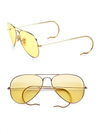A sunny update to the classic aviator style, crafted in sleek, sophisticated metal with round temple tips. Available in gold with ambermatic lens.Metal temples100% UV protectionMade in Italy A sunny update to the classic aviator style, crafted in sleek, sophisticated metal with round temple tips. Available in gold with ambermatic lens.Metal temples100% UV protectionMade in Italy