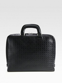 Single gusset briefcase crafted from gancini stamped calfskin leather featuring a removable, inside computer pocket to secure your investment in style.Zip closureDouble top handlesInterior pocketsLeather15W x 11H x 2DMade in Italy Single gusset briefcase crafted from gancini stamped calfskin leather featuring a removable, inside computer pocket to secure your investment in style.Zip closureDouble top handlesInterior pocketsLeather15W x 11H x 2DMade in Italy