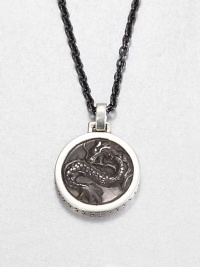 From the Naga Collection. A fierce dragon is carved in bold relief on a blackened sterling silver pendant with a stunning open back and a richly patterned edge, suspended on a chain of blackened stainless steel.Sterling silverStainless steelChain length, about 24Pendant diameter, about 1.5Lobster claspMade in Bali From the Naga Collection. A fierce dragon is carved in bold relief on a blackened sterling silver pendant with a stunning open back and a richly patterned edge, suspended on a chain of blackened stainless steel.Sterling silverStainless steelChain length, about 24Pendant diameter, about 1.5Lobster claspMade in Bali