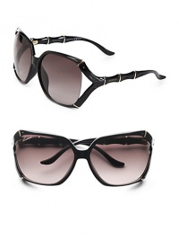 Rectangular frames with the natural allure of bamboo-inspired temples and details. Available in aubergine with brown gradient lens or shiny black with brown gradient lens. Logo temples100% UV protectionMade in Italy Rectangular frames with the natural allure of bamboo-inspired temples and details. Available in aubergine with brown gradient lens or shiny black with brown gradient lens. Logo temples100% UV protectionMade in Italy