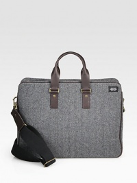 Inspired by suiting fabrics, this wool herringbone is a classic men's fabrication, complete with a leather strap and handles and interior functionality including a laptop sleeve and zip pocket.Zip closureDouble top handlesAdjustable shoulder strapWool/leather17W x 13H x 6DImported Inspired by suiting fabrics, this wool herringbone is a classic men's fabrication, complete with a leather strap and handles and interior functionality including a laptop sleeve and zip pocket.Zip closureDouble top handlesAdjustable shoulder strapWool/leather17W x 13H x 6DImported