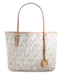 Jet set in style with this classic signature tote by MICHAEL Michael Kors. 18K goldtone hardware and a roomy interior give this travel-ready look a luxurious appeal in any time zone. Jet set in style with this classic signature tote by MICHAEL Michael Kors. 18K goldtone hardware and a roomy interior give this travel-ready look a luxurious appeal in any time zone.