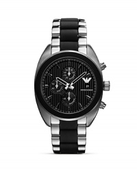A hard-hitting take on sporty style, Emporio Armani's bold black-faced chronograph is an athletic add-on. Wear it to work or to work out; it will be on-trend anywhere you fasten it. A hard-hitting take on sporty style, Emporio Armani's bold black-faced chronograph is an athletic add-on. Wear it to work or to work out; it will be on-trend anywhere you fasten it.
