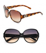 Chic round frames with signature Tory logo at temple. Available in tortoise with brown gradient lens or black with grey orange fade lens. UV 400 lens Imported 