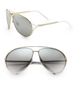 A cool, classic aviator design in lightweight metal. Available in gold-black with grey gradient lens or gold-white with silver gradient lens. Metal logo temples100% UV protectionMade in Italy