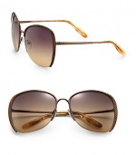 Get lost in these stylish, lightweight metal sunglasses with braided metal temples. Available in brass with brown gradient lens.Metal temples100% UV protectionMade in Italy