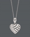 A look you'll simply adore. Victoria Townsend's lovable heart pendant shines with the addition of sparkling diamonds accents. Setting and chain crafted in sterling silver. Approximate length: 18 inches. Approximate drop: 8/10 inch.