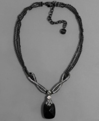 Satisfy your style cravings with this delectable necklace by Givenchy. A jet black pendant is highlighted with crystal accents set in hematite-plated mixed metal. Approximate length: 10 inches + 3-inch extender. Approximate drop: 3 inches. Satisfy your style cravings with this delectable necklace by Givenchy. A jet black pendant is highlighted with crystal accents set in hematite-plated mixed metal. Approximate length: 10 inches + 3-inch extender. Approximate drop: 3 inches.