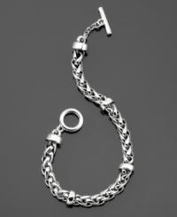 Smooth, sleek and always stylish. This silvertone mixed metal braided chain bracelet by Lauren by Ralph Lauren features a toggle & bar closure. Approximate length: 8 inches. Smooth, sleek and always stylish. This silvertone mixed metal braided chain bracelet by Lauren by Ralph Lauren features a toggle & bar closure. Approximate length: 8 inches.