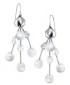 Lovely and luminous. Iridescent mother-of-pearl accents add an ethereal sensibility to these delicate drop earrings from Breil. Crafted in silver tone stainless steel. Approximate drop: 2-8/10 inches.