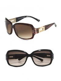 Acetate rectangular frames with exotic print temples adorned with signature hardware with logo. Available in havana snake with brown gradient lens or black leopard with gray rose lens. 100% UV protection Made in Italy Acetate rectangular frames with exotic print temples adorned with signature hardware with logo. Available in havana snake with brown gradient lens or black leopard with gray rose lens. 100% UV protection Made in Italy