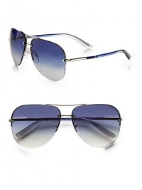 Favorite aviator design in a modern rimless style with logo engraved detail. Available in silver with blue gradient lens and brown demi shiny with brown gradient lens.UV400 lensTubular templeMade in Italy Favorite aviator design in a modern rimless style with logo engraved detail. Available in silver with blue gradient lens and brown demi shiny with brown gradient lens.UV400 lensTubular templeMade in Italy