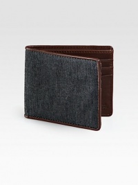 Taken from heritage suiting fabric, this wallet embodies a classic tailoring aesthetic and is French-edged with leather.One billfold compartmentSix card slotsCotton/leather4W x 4HImported