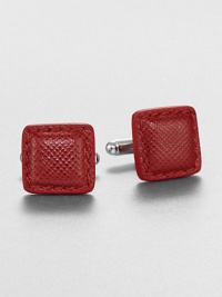 Distinctive cuff links crafted of textured leather. About 0.6 squareMade in Italy Distinctive cuff links crafted of textured leather. About 0.6 squareMade in Italy