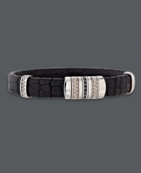 Sleek sophistication. This stylish men's cuff bracelet features a genuine crocodile band, sterling silver accents, and round-cut black diamonds (1/4 ct. t.w.). Approximate length: 8-1/2 inches. Approximate width: 1/2 inch. Sleek sophistication. This stylish men's cuff bracelet features a genuine crocodile band, sterling silver accents, and round-cut black diamonds (1/4 ct. t.w.). Approximate length: 8-1/2 inches. Approximate width: 1/2 inch.