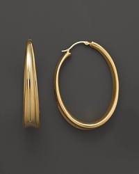 These bold 14K. gold hoops are a fresh take on the classic silhouette. These bold 14K. gold hoops are a fresh take on the classic silhouette.