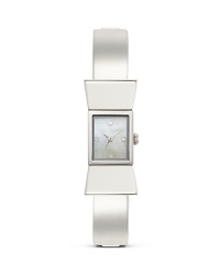 A little bit pretty, a little bit practical, this kate spade new york bangle is totally one to watch, cast in stainless steel with a Mother of Pearl dial as the complement. A little bit pretty, a little bit practical, this kate spade new york bangle is totally one to watch, cast in stainless steel with a Mother of Pearl dial as the complement.