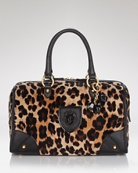 Juicy Couture has a whole new way to show your spots. Crafted of printed velour, this spaciously sized satchel is a wildly practical daytime choice. Juicy Couture has a whole new way to show your spots. Crafted of printed velour, this spaciously sized satchel is a wildly practical daytime choice.