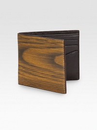 Heritage menswear goes luxe with this printed leather bill fold featuring interior card pockets and cotton twill lining for ease of use.One bill compartmentSix card slotsLeather4W x 4HImported Heritage menswear goes luxe with this printed leather bill fold featuring interior card pockets and cotton twill lining for ease of use.One bill compartmentSix card slotsLeather4W x 4HImported
