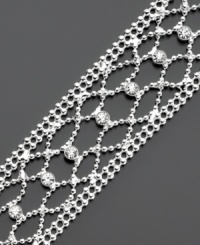 A delicate silvertone, open-weave design with sparkling crystals adds instant impact to any look. Length measures 7-1/4 inches. A delicate silvertone, open-weave design with sparkling crystals adds instant impact to any look. Length measures 7-1/4 inches.