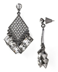 These boldly styled Rebecca Minkoff drop earrings exude a tony allure, detailed with dangling stone centers and a sleek diamond-shaped silhouette. These boldly styled Rebecca Minkoff drop earrings exude a tony allure, detailed with dangling stone centers and a sleek diamond-shaped silhouette.