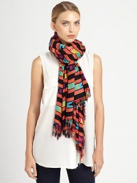 Wearable art takes a new form on this lightweight scarf adorned with a vibrant, tribal-inspired print and allover fringe trim.Viscose44 X 78Hand washImported Wearable art takes a new form on this lightweight scarf adorned with a vibrant, tribal-inspired print and allover fringe trim.Viscose44 X 78Hand washImported
