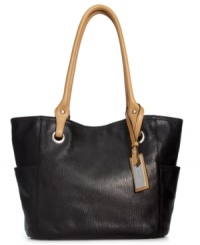 Shoulder this impossibly chic silhouette from Calvin Klein with elegance and ease. Crafted from soft metallic leather with gleaming hardware, its spacious design makes it the perfect companion for workdays or weekends away. Shoulder this impossibly chic silhouette from Calvin Klein with elegance and ease. Crafted from soft metallic leather with gleaming hardware, its spacious design makes it the perfect companion for workdays or weekends away.