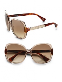 THE LOOKOversized rounded square styleTranslucent acetate framesCrocodile-embossed leather and logo accented templesUVA and UVB protectionSignature case includedTHE COLORChampagne with brown gradient lensesORIGINMade in Italy THE LOOKOversized rounded square styleTranslucent acetate framesCrocodile-embossed leather and logo accented templesUVA and UVB protectionSignature case includedTHE COLORChampagne with brown gradient lensesORIGINMade in Italy